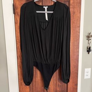 Free People black long sleeved thong body suit
